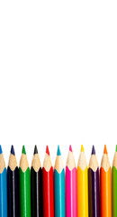 Colored pencils on an isolated white background with copy space, blank for banner