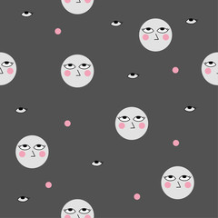 Painted faces on the gray background