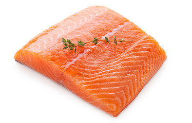 Fresh raw salmon filet with thyme sprig