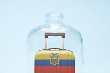 Luggage in isolation under glass cover covid-19 Ecuadorian tourism abstract.