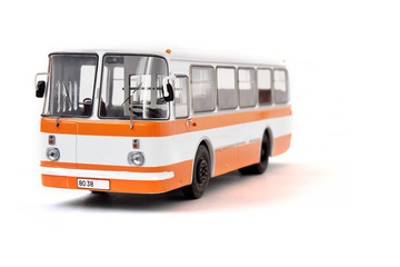 Scale model of a white yellow Russian bus. Toy yellow bus