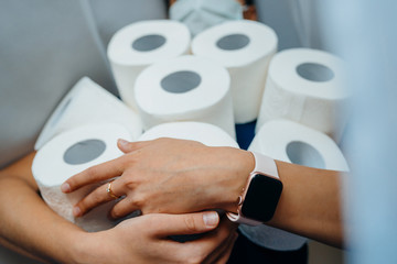 People are stocking up toilet paper for home quarantine from coronavirus.