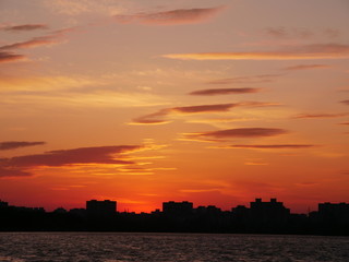 Lake at sunset, on a background of trees. Reflection of nature in the lake. Diamond Lake Kiev, Ukraine.
