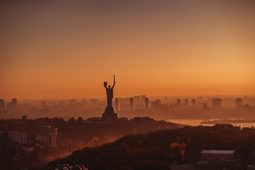 Mother Motherland monument at sunset. In Kiev, Ukraine.