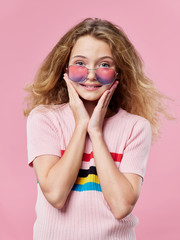 Jolly girl charm fashion glasses studio pink background model