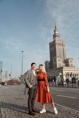a young couple traveling European cities. Love story in Warsaw.