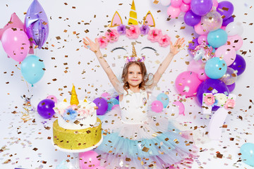 Unicorn Girl throws confetti. Idea for decorating unicorn style birthday party. Unicorn decoration...