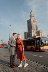 a young couple traveling European cities. Love story in Warsaw.