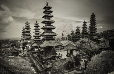 Art black & white photo of Pura Besakih - the biggest holy, complex of Bali hindu temples, it is mother of Bali temples is located on the slope of sacred mountain Gunung Agung in Bali Indonesia