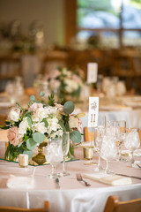 Wedding ceremony setting for a celebratory dinner iin pinks and white