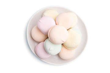 Colored zephyr or marshmallow isolated on white background. Top view.