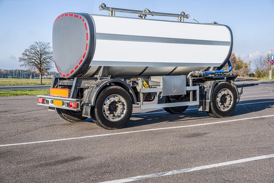 Car tank with milk . Trailer barrel, transportation of liquid goods