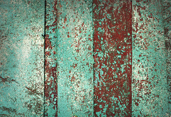Texture with covered paint. Green background with rust