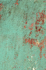 Texture with covered paint. Green background with rust