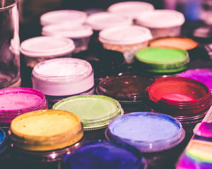close up of colorful paint and makeup