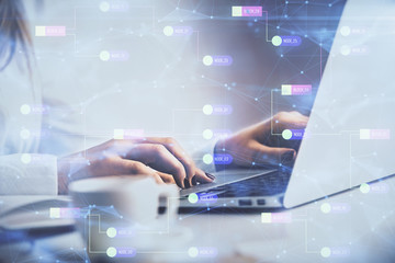 Multi exposure of woman hands working on computer and data theme hologram drawing. Tech concept.