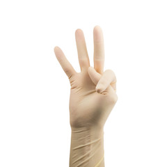 hand in protective latex surgical glove shows three palm isolated on white background, protection from a virus
