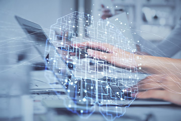 Multi exposure of woman hands working on computer and brain hologram drawing. Ai concept.