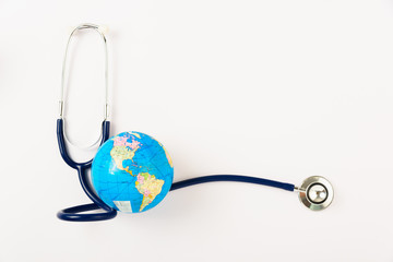 World health day concept, Stethoscope and globe on white background with copy space. Global health care.