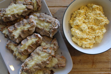 Cooked Karelian pies - Pirakka on a baking sheet. Dish of national cuisine - piirakka. Close-up.