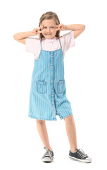 Cute little girl showing victory gesture on white background