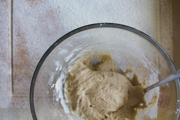 Rye Buckwheat dough rising in a bowl with a flour board dusted and used for baking