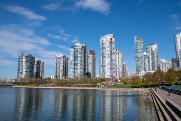 High rise buildings reflected on the surface of the False Creek .     Vancouver BC Canada
