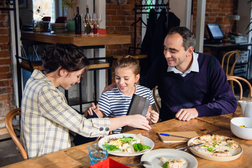 A mother receives a present she is really happy with