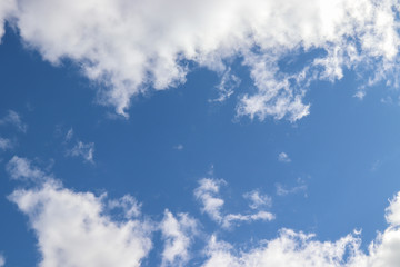 blue sky with clouds background with copy space, for Zoom background, concepts include cloud computing, heaven, religious, nature, outdoors 