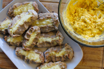 Close up view on freshly baked Karelian Pie with egg butter, a traditional topping to this dish in Finland