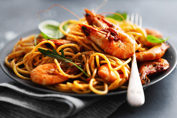 Pasta spaghetti with tomato sauce and shrimps