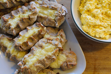 Close up view on freshly baked Karelian Pie with egg butter, a traditional topping to this dish in Finland