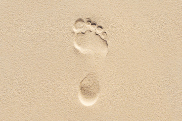 Plakat Footprint in the sand. Man on the planet.