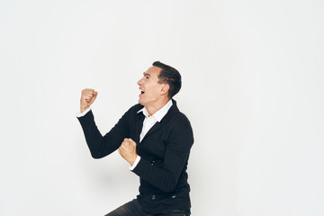 Obraz na płótnie Canvas Business man in suit self confidence emotions hand gestures studio