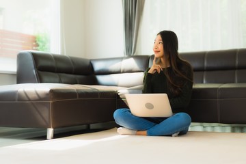 Portrait beautiful young asian woman use laptop computer