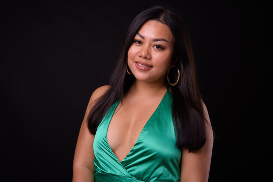 Beautiful Overweight Asian Woman Wearing Silky Green Dress