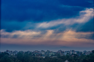 Fototapeta premium Sunrays Shining through the Morning Storm Clouds