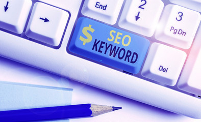 Text sign showing Seo Keyword. Business photo text phrases in your web content that help showing...
