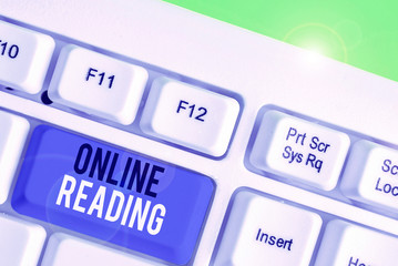 Text sign showing Online Reading. Business photo showcasing process of extracting meaning is in a...