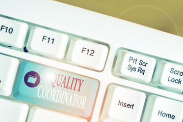 Conceptual hand writing showing Quality Coordinator. Concept meaning monitor and improve the...