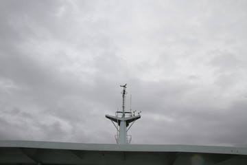 ferry under gray sky