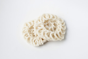 Traditional Indonesia basic round curly cracker isolated on white high definition