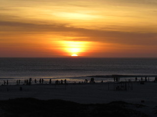 Naklejka na ściany i meble Sunset over the Big Beach - Arraial do Cabo 