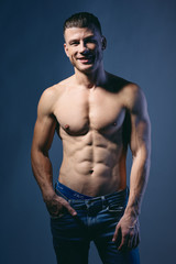 Fototapeta na wymiar muscular young man posing