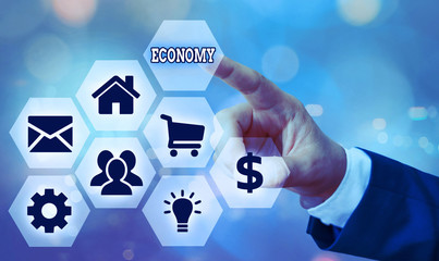 Conceptual hand writing showing Economy. Concept meaning Management of financial resources...