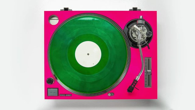 Animation of records stacked on vintage record player.