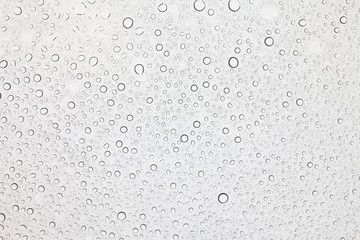 Rain droplets on glass background, Water drops on glass.