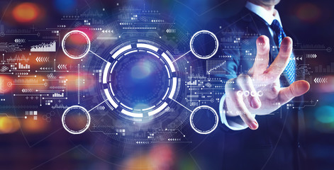 Tech circle with businessman on night city background