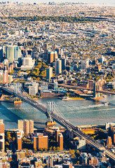 Fototapeta premium Aerial view of the Lower East Side of Manhattan the Brooklyn and Manhattan bridges