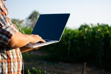 Gardeners check soil conditions for farming